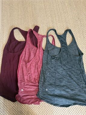 Three Lululemon Athletic Tank Tops